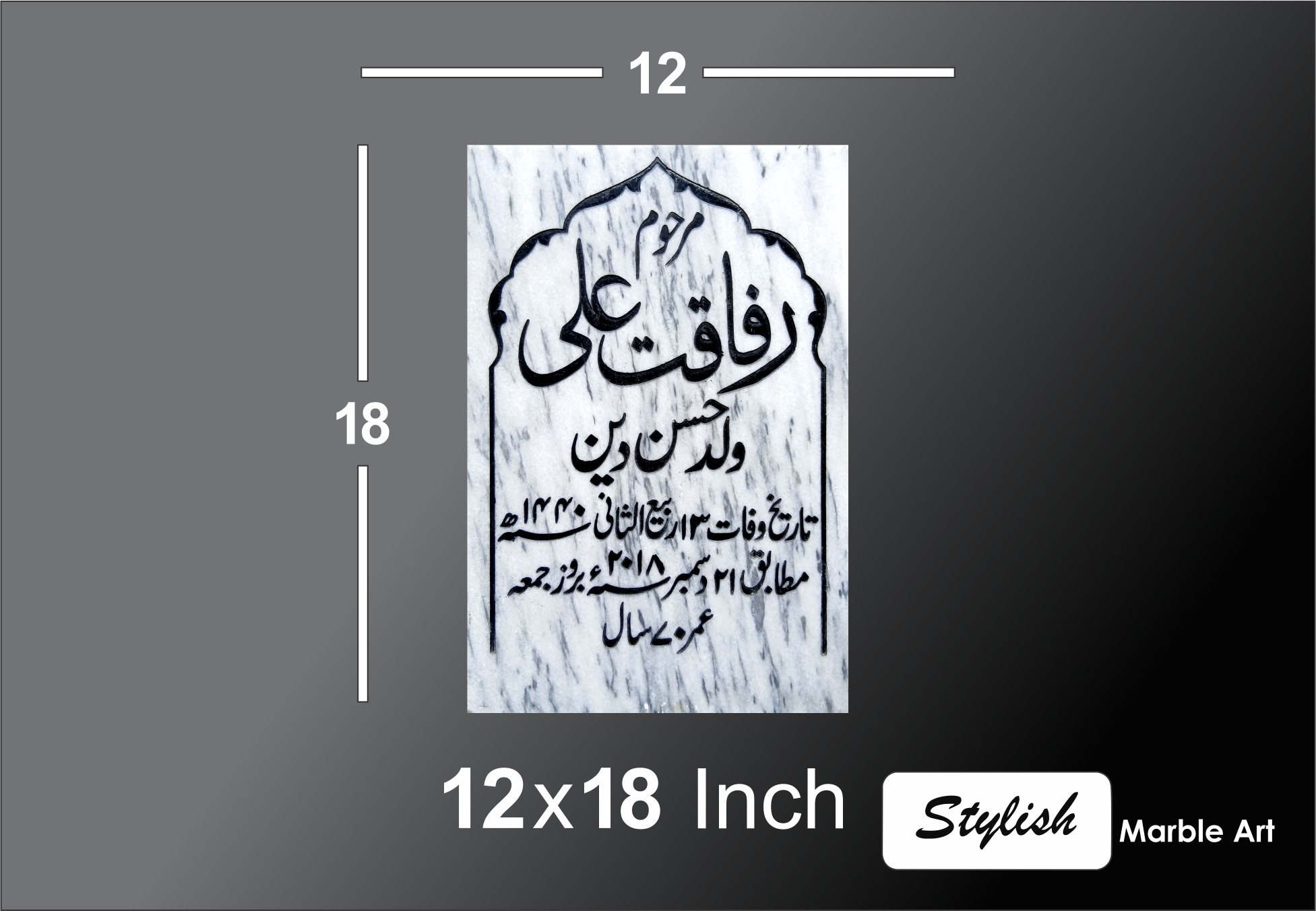 A recently installed black granite headstone.